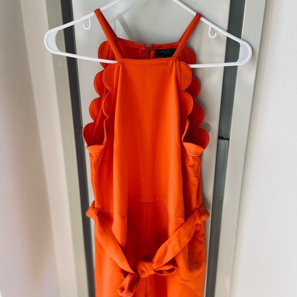 Orange Victoria Beckham romper with belt